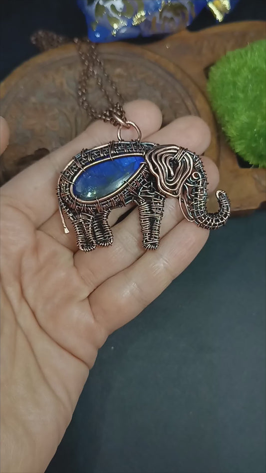 Blue elephant pendant.