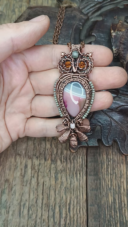 Owl necklace.