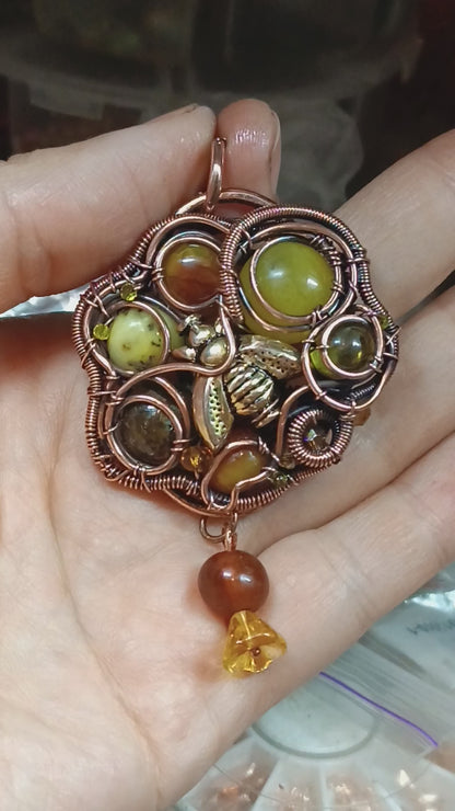 Bee pollinating. Wire wrapped pendant.