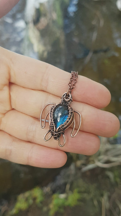 Little dark blue labradorite sea turtle charm.