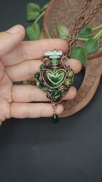 Green heart vial necklace
