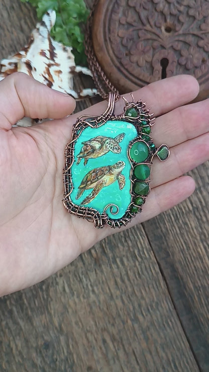 Aquatic adventure 🐢🦦 Hand painted wire wrapped necklace. 2 sided.