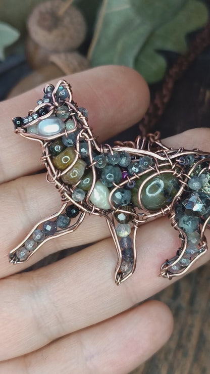 Wolf pendant.