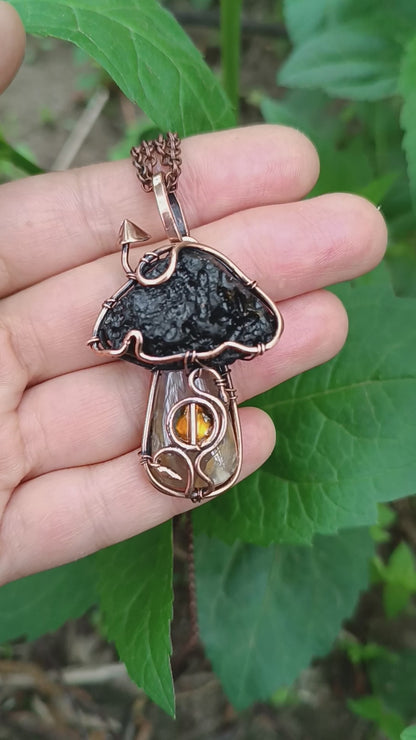 Mushroom fairy house pendant.