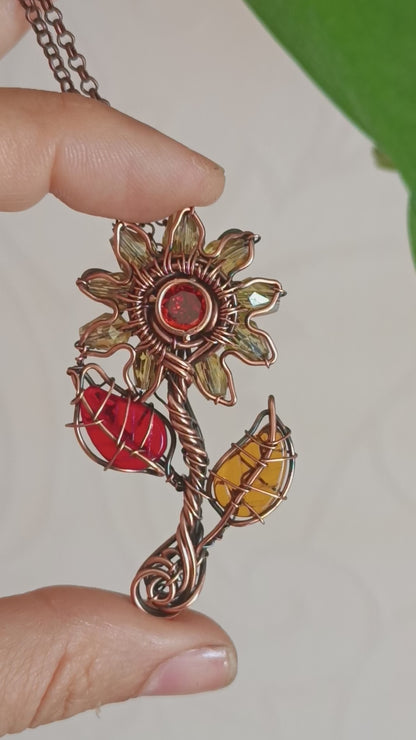 Sunflower pendant with red leaf