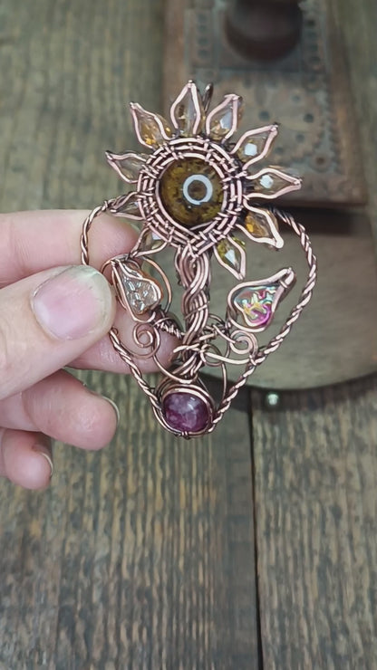 Sunflower pendant with garnet root