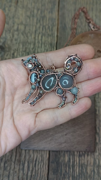 Sweet puppy. Detailed wire wrapped and beaded pendant.