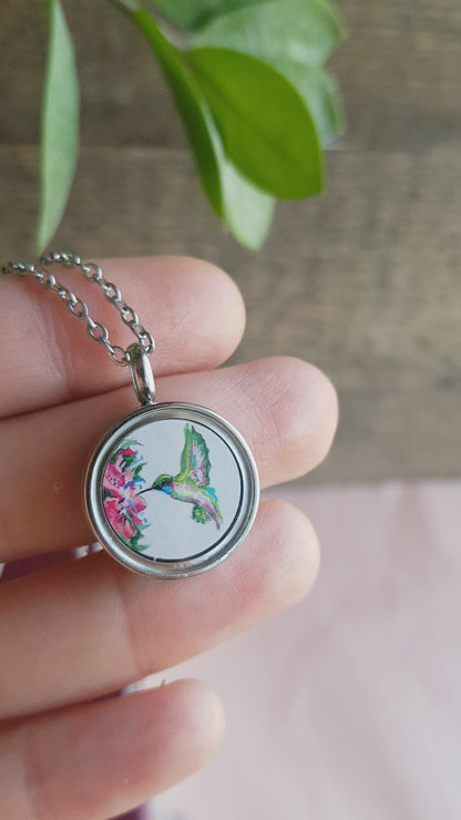 Hummingbird and pink flowers. Double sided mini locket.