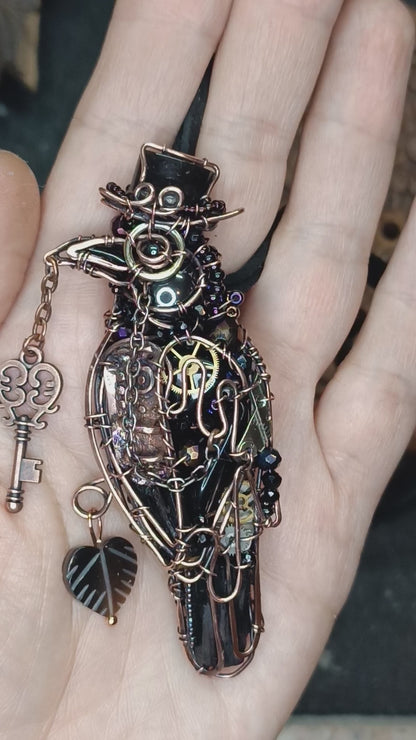 Steampunk raven necklace.
