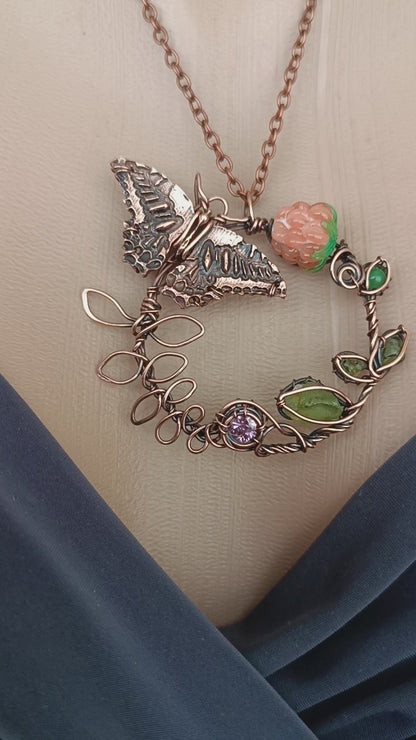 Life circle. Pink raspberry butterfly necklace