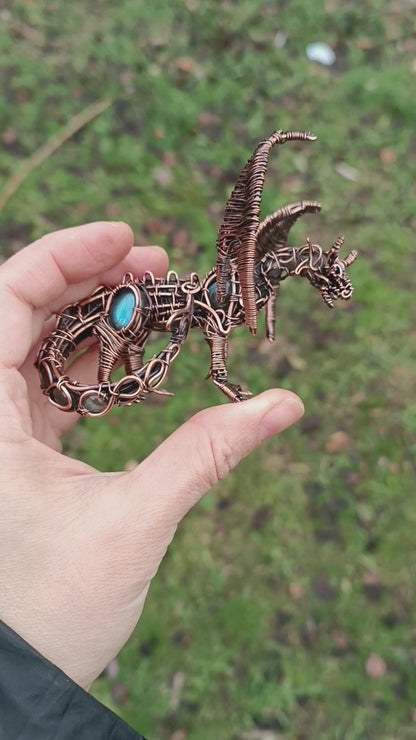 Dragon figurine with labradorites.