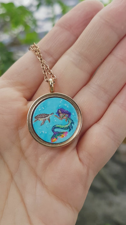 Mini reversible Mermaid and sea turtles pendant.