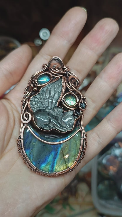 Winged kitty sleeping on the moon