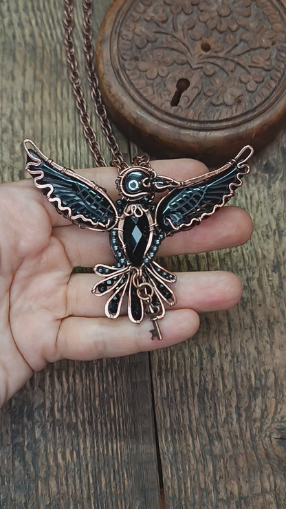 Secret keeper. Raven necklace with open wings.