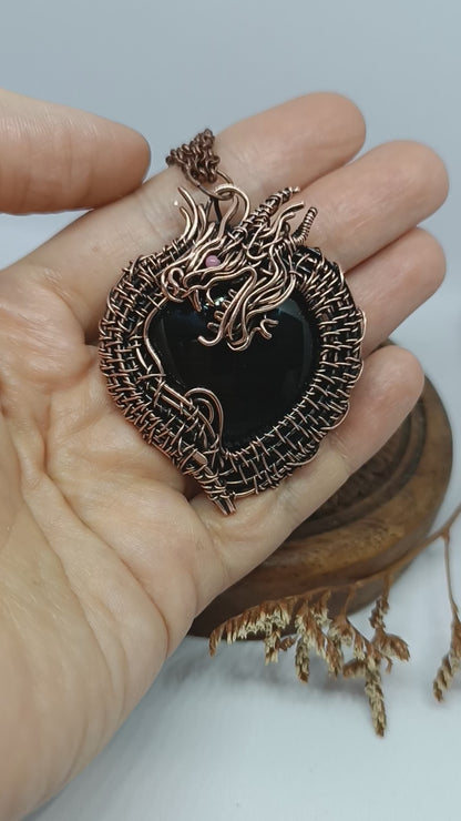 Black obsidian dragon pendant.