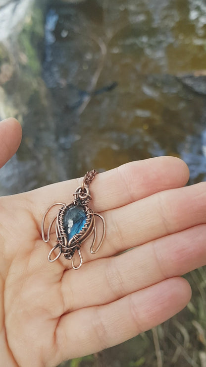 Little dark blue labradorite sea turtle charm.