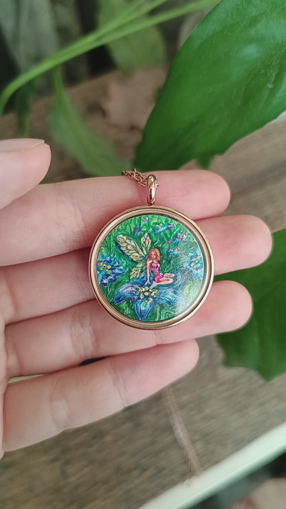 Fairy Flora and her fairy house. Mini magic painted necklace.