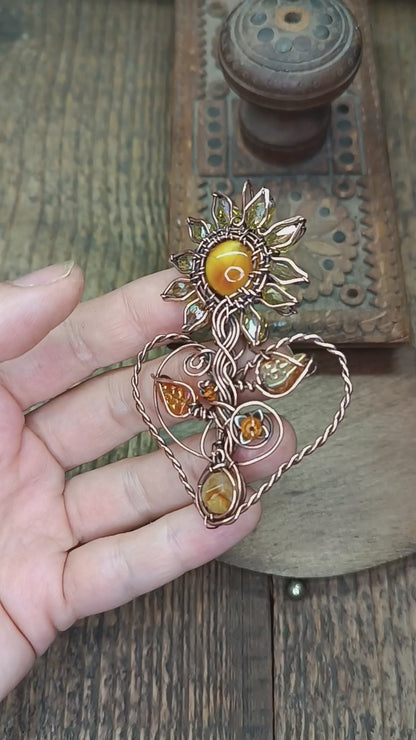 Sunflower pendant with citrine root.