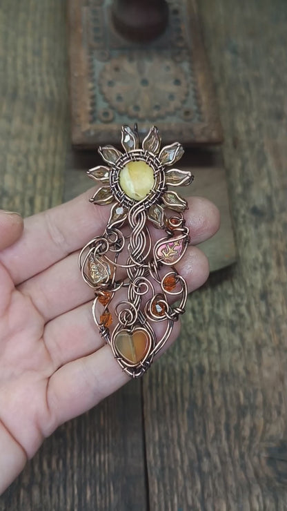 Sunflower pendant with carnelian heart root