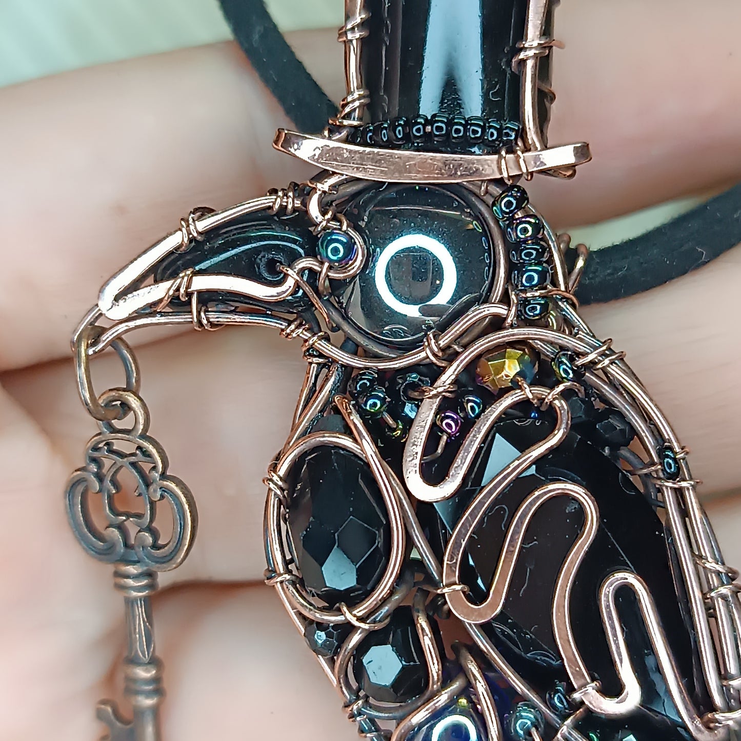 Mr Raven, the Secret Keeper necklace.