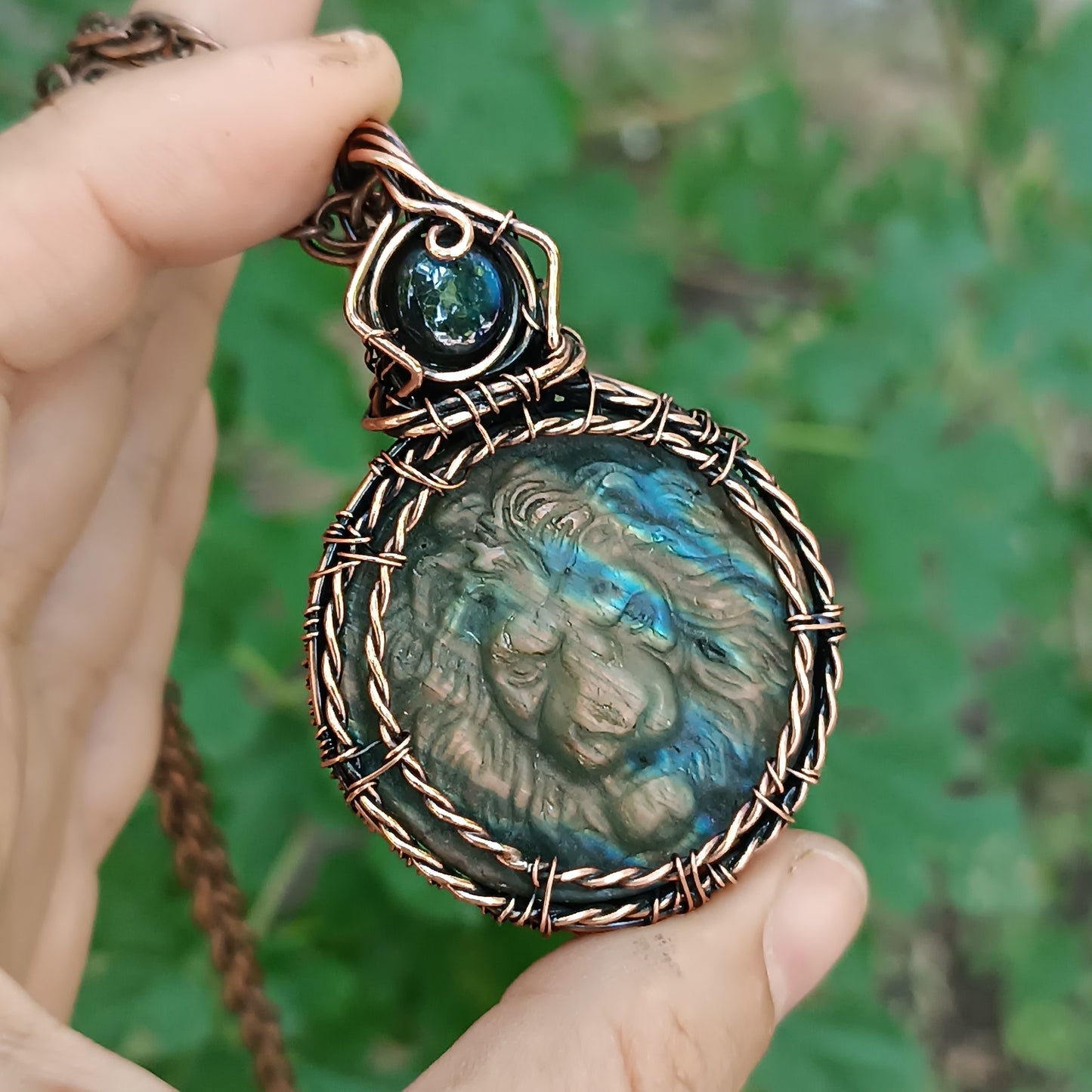 Carved leo labradorite necklace.