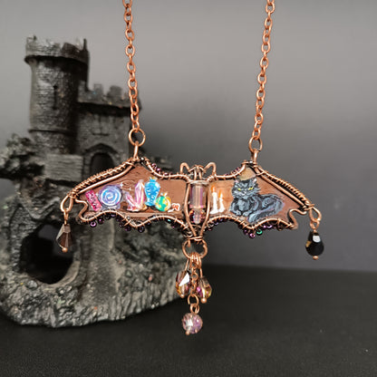 Halloween story. Painted bat necklace