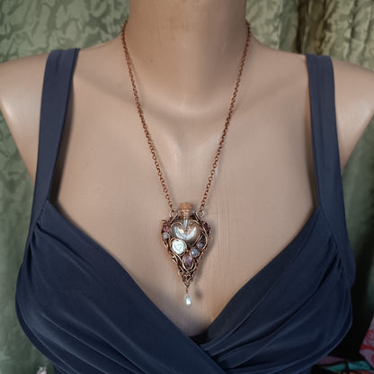 Whispering Dawn. Vial necklace