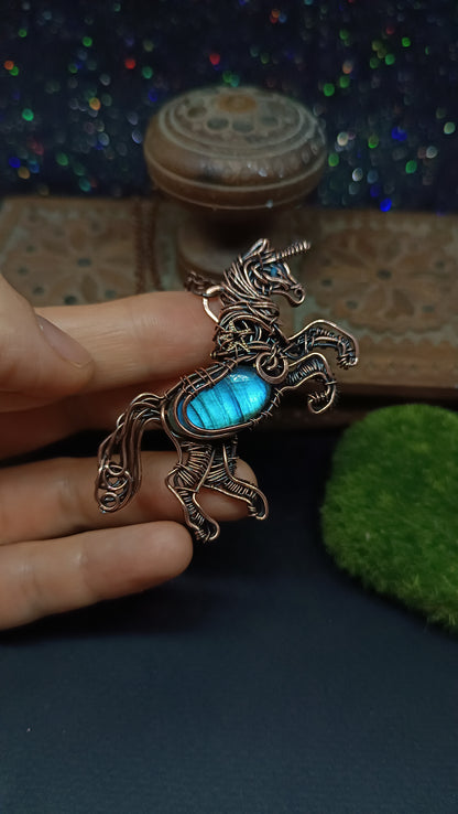 Unicorn and the falling star. Copper pendant with labradorites.