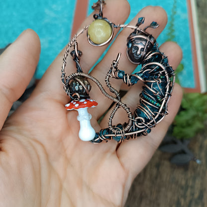 Blue caterpillar necklace