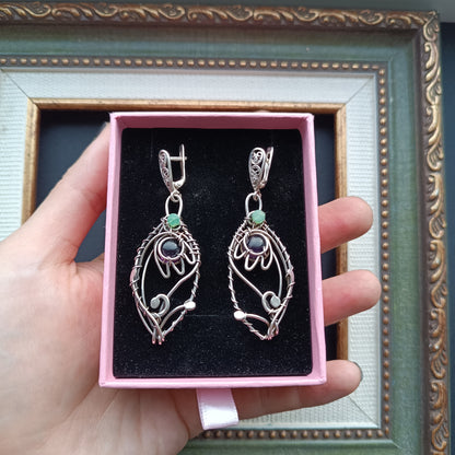 Silver dangling earrings. Amethyst bells.