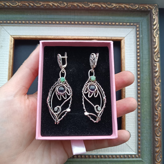 Silver dangling earrings. Amethyst bells.