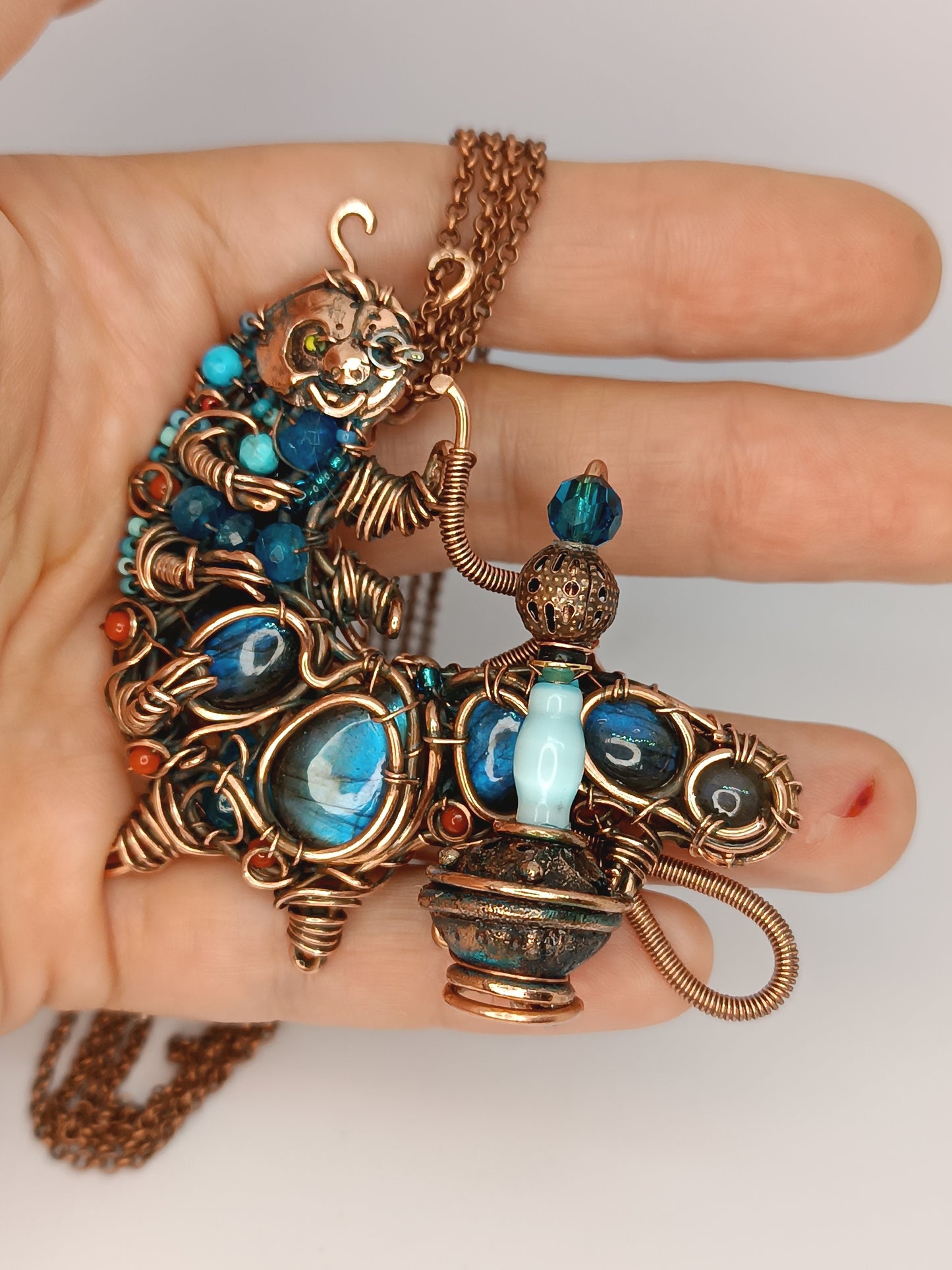 Blue caterpillar necklace