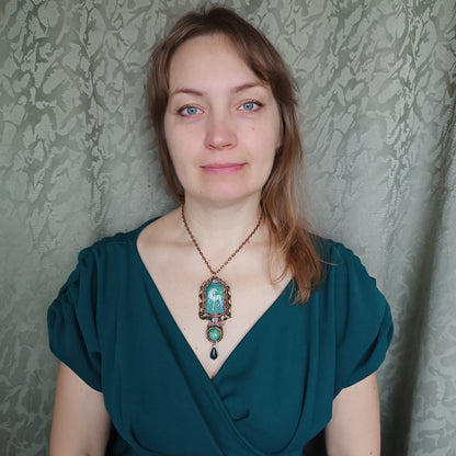 The ballad of white unicorn and princess. Wire wrapped necklace with miniature paintings.