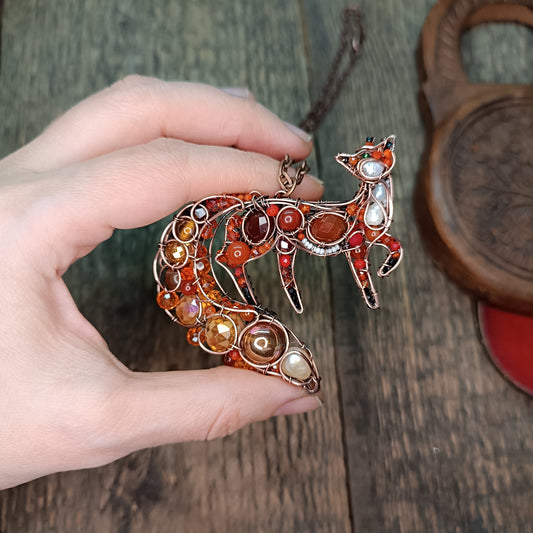 Swoopy tail Foxy. Sparkly wire wrapped pendant.