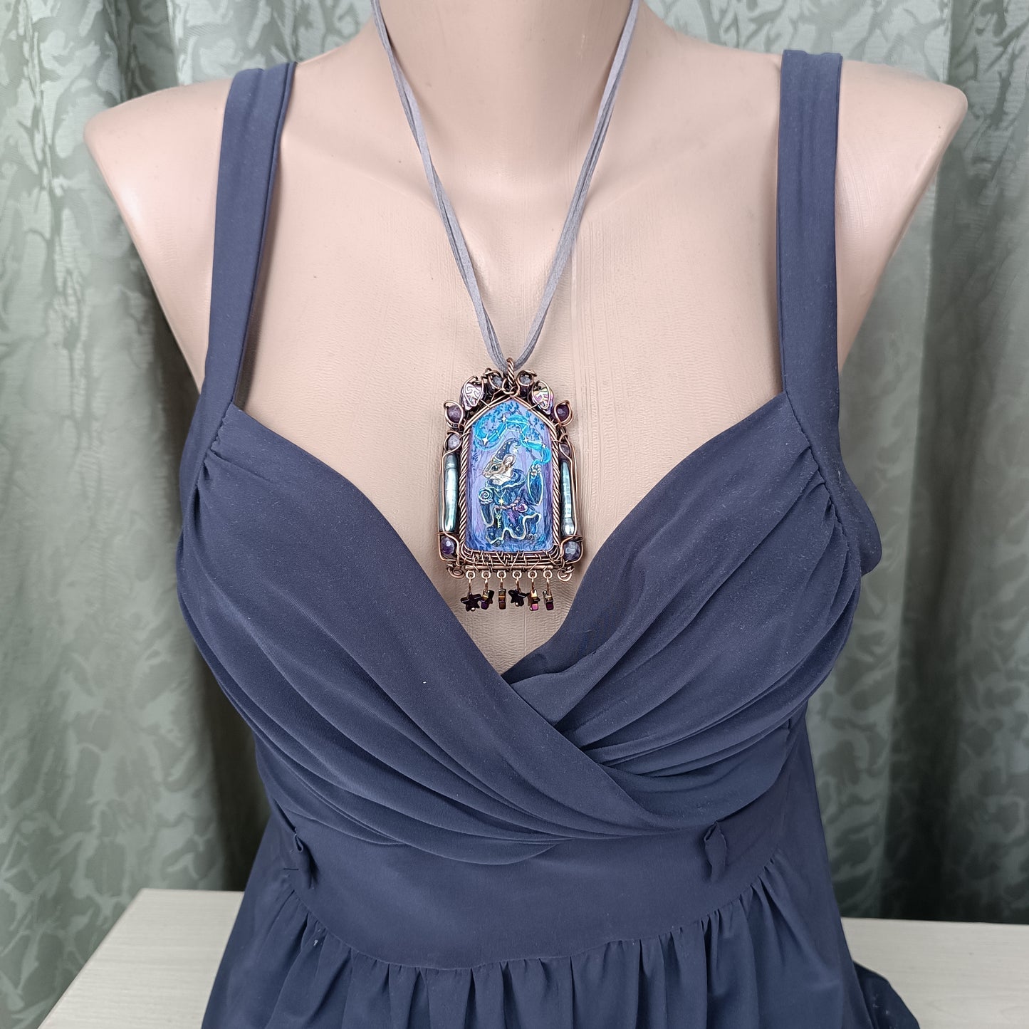 "Tiny magician". Wearable art necklace.