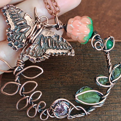 Life circle. Pink raspberry butterfly necklace