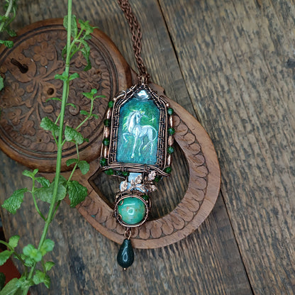 The ballad of white unicorn and princess. Wire wrapped necklace with miniature paintings.