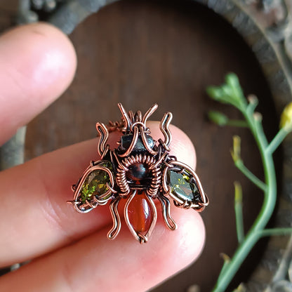Green olive wings bee charm.
