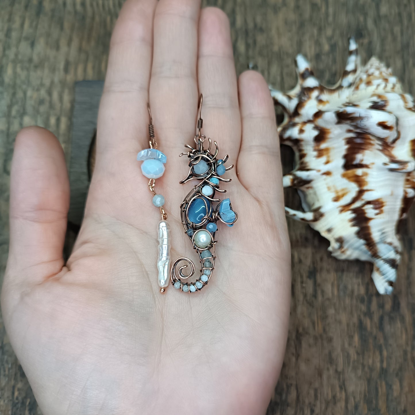 Blue and white seahorse earrings