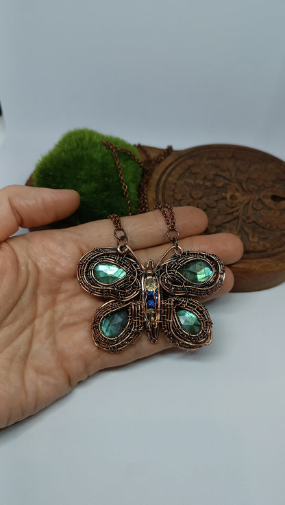 Copper wire wrapped butterfly necklace with faceted labradorites