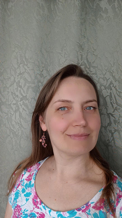 Seahorse dangling earrings.
