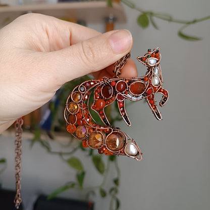 Swoopy tail Foxy. Sparkly wire wrapped pendant.