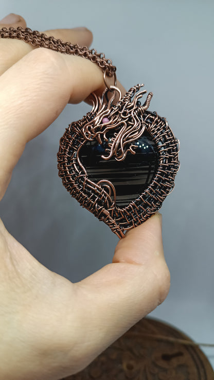 Black obsidian dragon pendant.