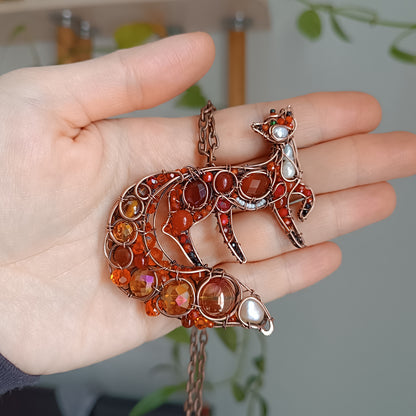 Swoopy tail Foxy. Sparkly wire wrapped pendant.