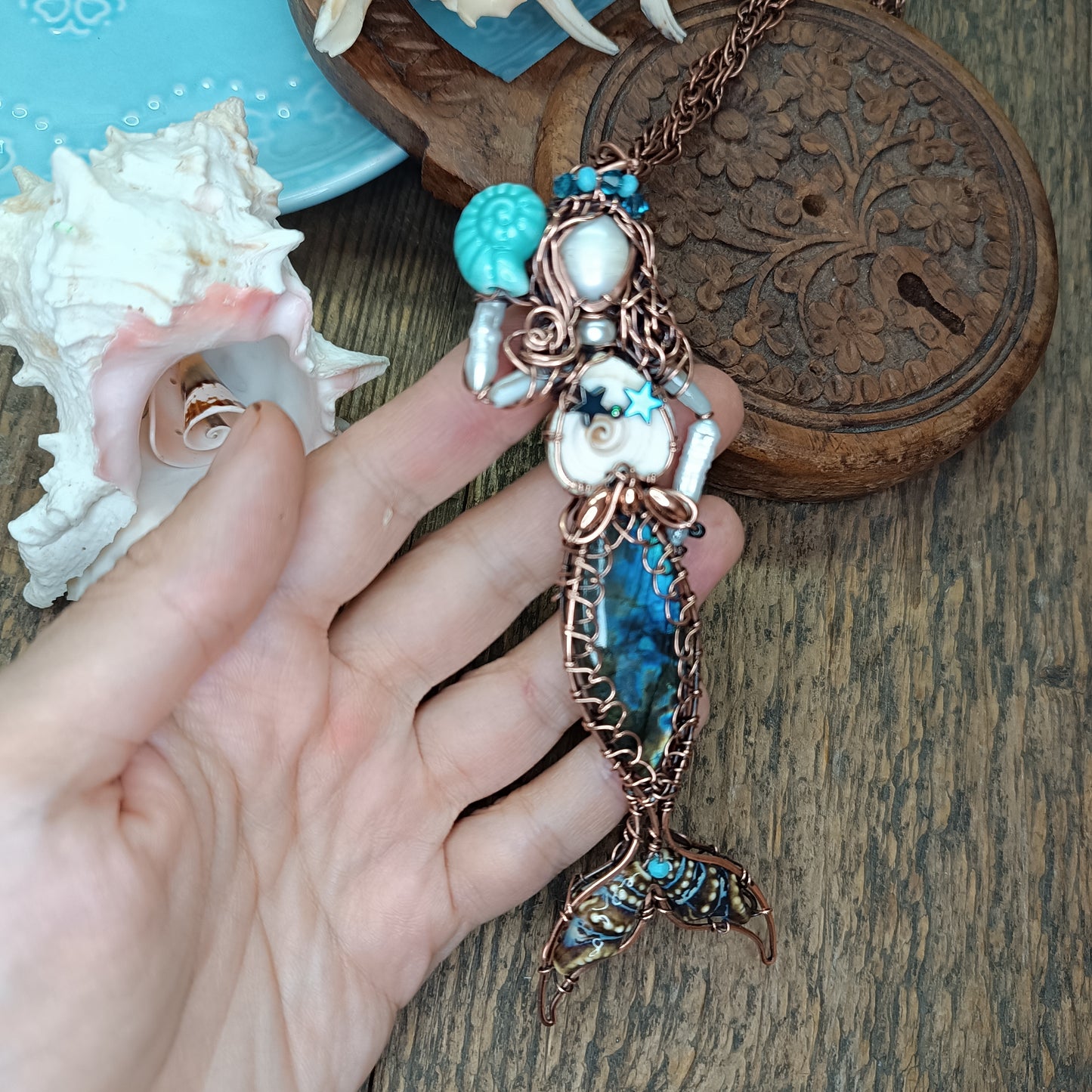 Listening to the ocean. 🧜🐚🩵
