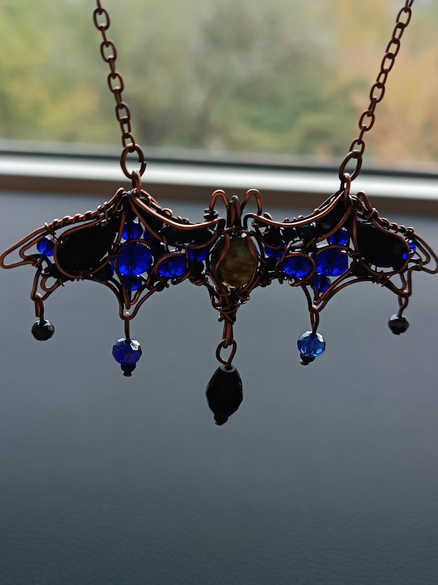 Midnight whisper. Bat necklace.
