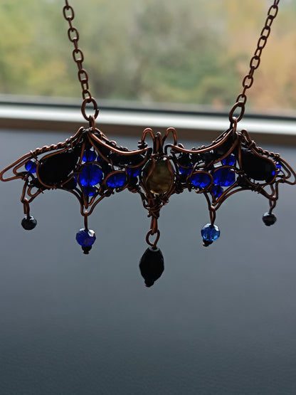 Midnight whisper. Bat necklace.