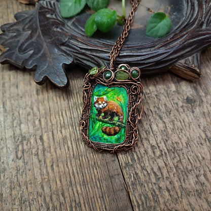 Red panda and a butterfly necklace. Reversible.