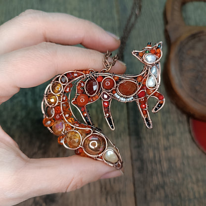 Swoopy tail Foxy. Sparkly wire wrapped pendant.