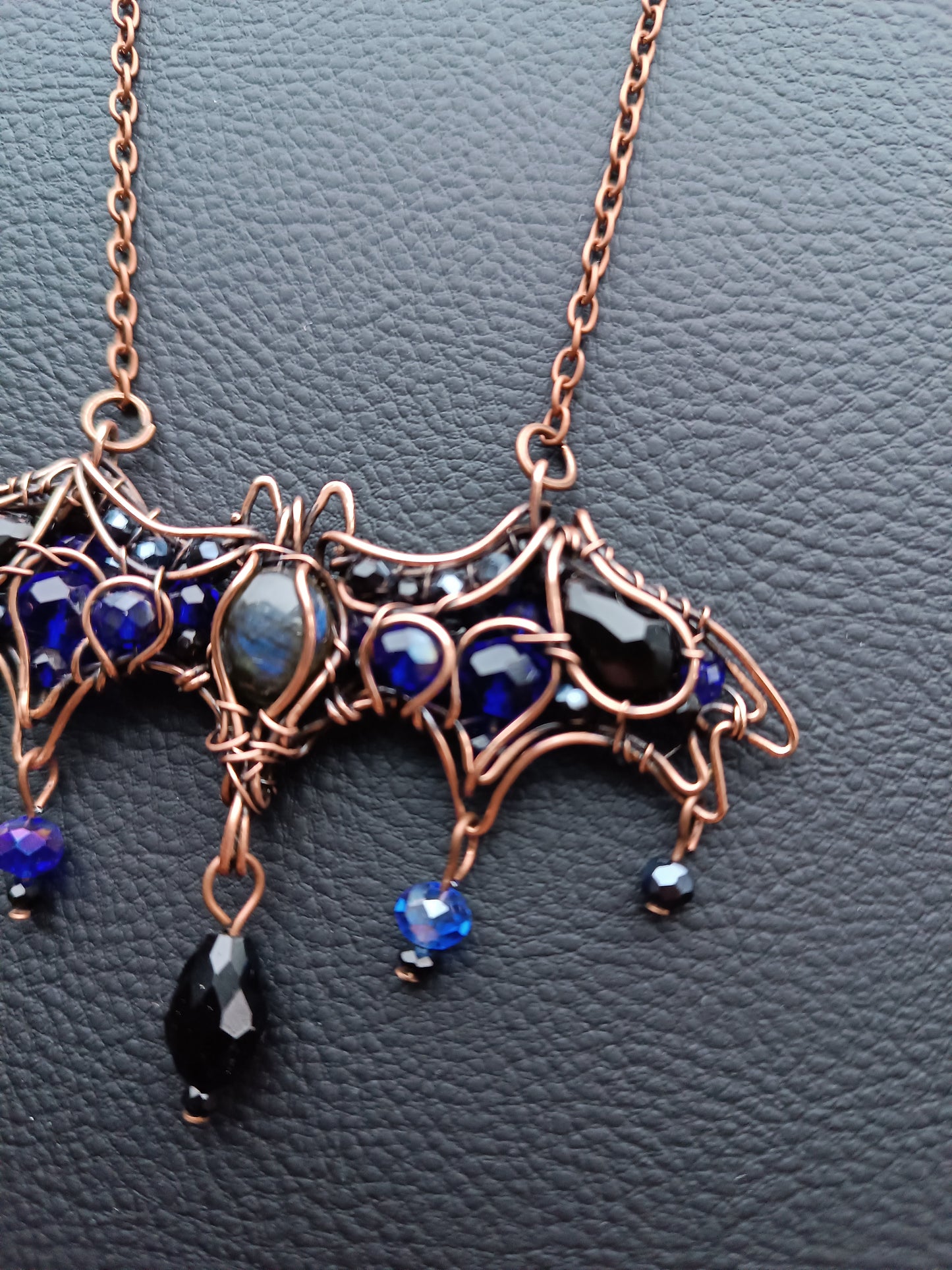 Midnight whisper. Bat necklace.